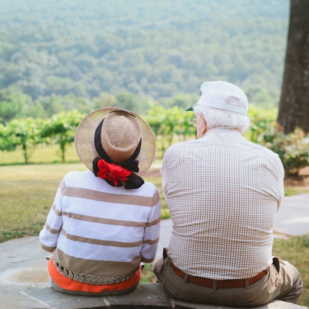 couple sitting on pathway